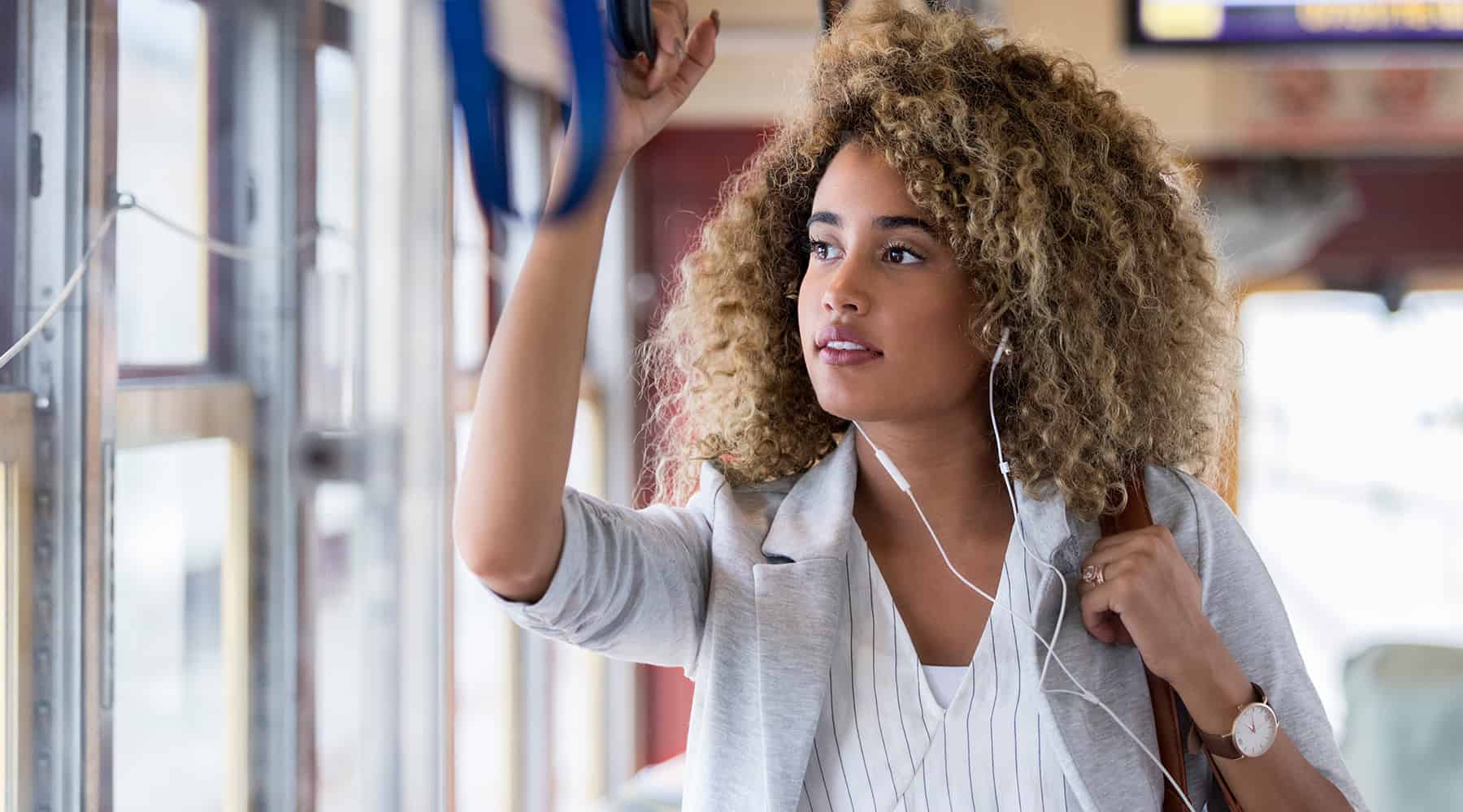 A young woman rides the Bay Area Public Transportation near Concorde, California